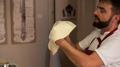 Chef Max making Pizza on one of Walks Inside Rome's Cooking Classes