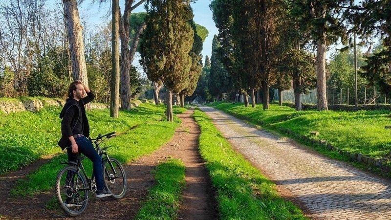Alexander on his bike on the Old Appian Way