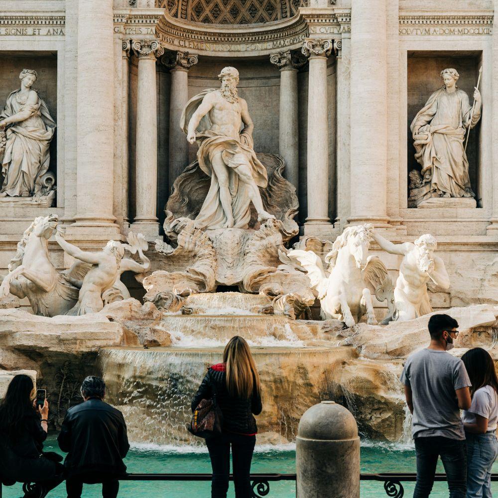 Tourist in front of Trevi's Fountain
