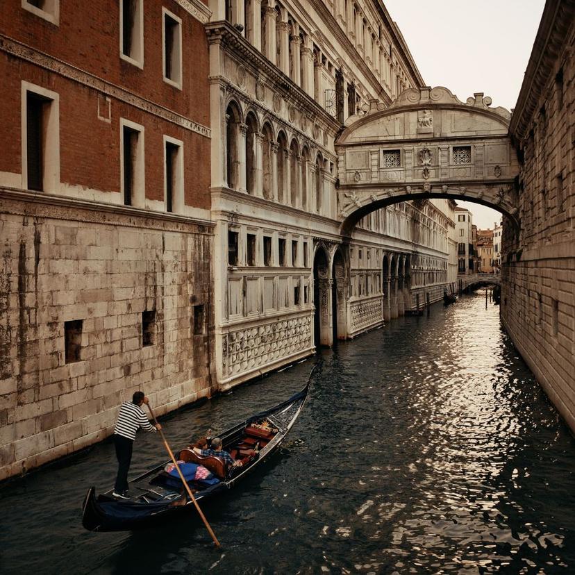 A gondolier in a Venice Canal