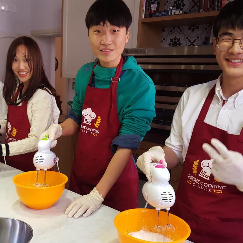 Kids learning how to make a perfect Tiramisù in Rome