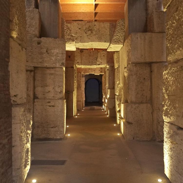Illuminated corridor along the Colosseum Underground path on a VIP tour with special access