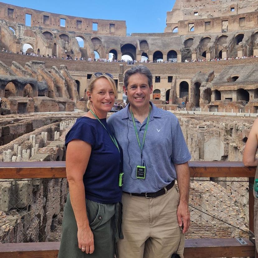 Couple inside the Colosseum amphitheater during a private Ancient Rome and Colosseum tour