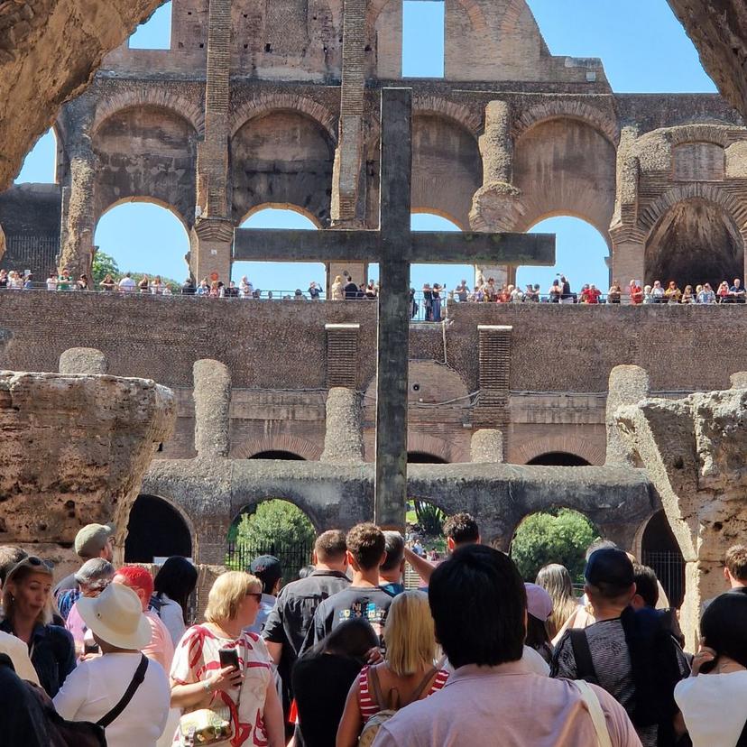 Cross inside the Colosseum, symbol of its later Christian history, visited on a Colosseum and Pantheon tour