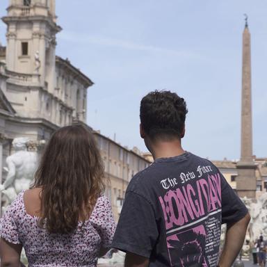 Couple visiting Piazza Navona for the first time while exploring Rome on foot