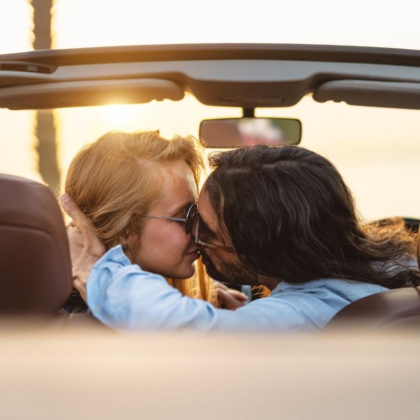 Couple in a luxury car in Rome