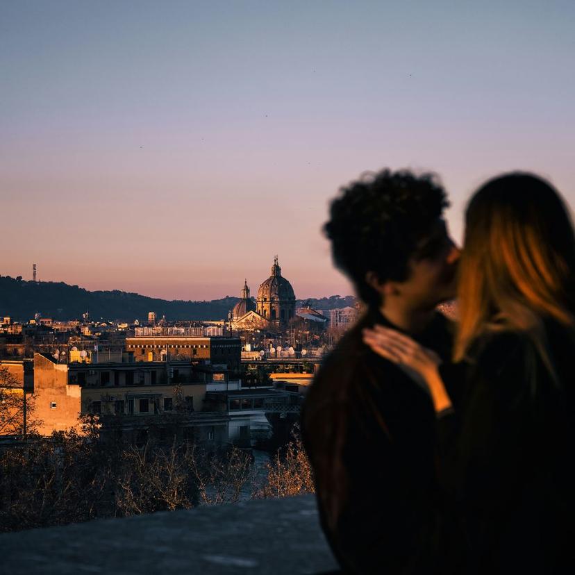 Lovers in Rome with sunset for Valentine's day